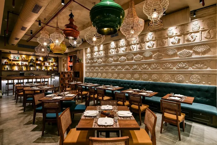 Stylish restaurant interior with distinctive lighting and detailed wall design