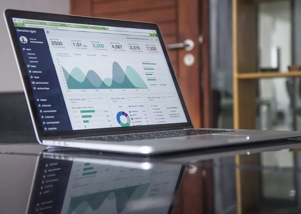 Website analytics and performance reporting displayed on a laptop